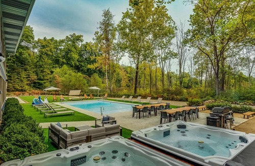 Berrien Springs House | Modern Country Home w/ Heated Pool, 2 Hot Tubs, Fire Pit & Home Theater