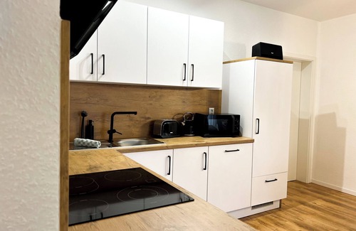 Schwarzenlache Apartment | Modern, cozy apartment in Sulzdorf with WLAN & close to shopping center