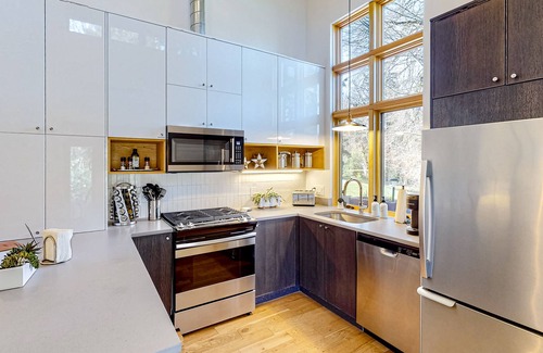 Concord Cottage | Modern creekside cottage with patios, yard & great location for exploring