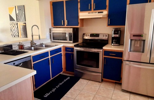 Naples Condo | Modern Deco Condo in Naples, Bershire lakes community pools heated tennis