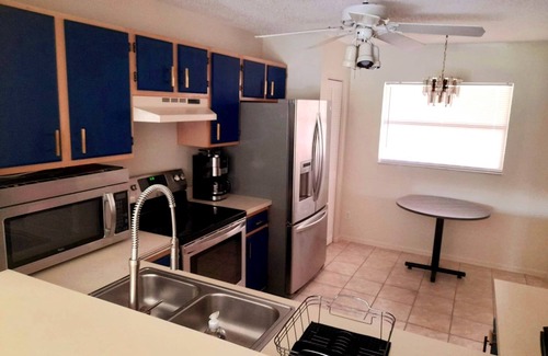 Naples Condo | Modern Deco Condo in Naples, Bershire lakes community pools heated tennis