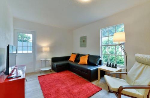 Buena Vista Apartment | Modern Design District Getaway With Hot Tub and Garden