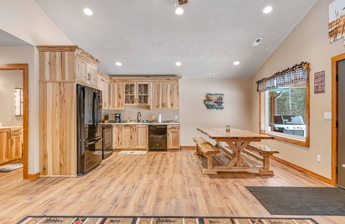 Conover Cabin | Modern dog-friendly cabin with hot tub, gas fireplace, patio, grill, & central AC