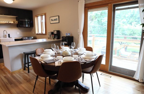 Upper Rattlesnake House | Modern dog-friendly retreat, with large deck, gardens, pond, and trails.