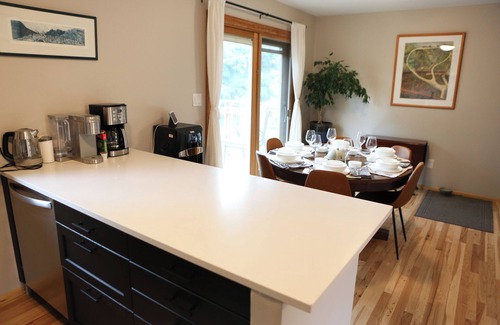 Upper Rattlesnake House | Modern dog-friendly retreat, with large deck, gardens, pond, and trails.