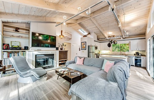 Anchor Bay House | Modern, Dog-Friendly Retreat with a Private Deck, Hot Tub, Fireplace, & Sun Room