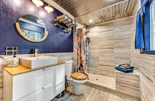 Anchor Bay House | Modern, Dog-Friendly Retreat with a Private Deck, Hot Tub, Fireplace, & Sun Room