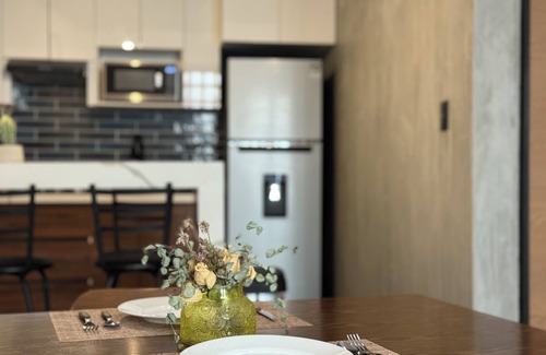 Saltillo Apartment | Modern double-height loft new and equipped with its own parking lot
