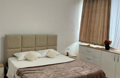 Tirana House | Modern downtown room with private bathroom. Pets allowed.