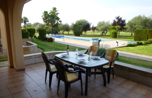 San Jorge House | Modern duplex house overlooking communal pool and gardens at Golf Panoramica.
