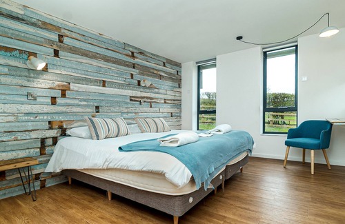 Newton Grange Cabin | Modern eco-lodge with a private hot tub & picturesque views