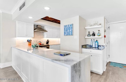 Wrightsville Beach Condo | Modern Elegance Meets Coastal Escape: Explore Newly Updated 2 BR Penthouse Condo