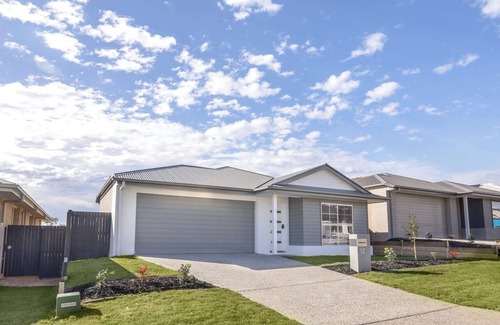 Greenbank House | Modern Family Retreat in Premier GreenbankLocation