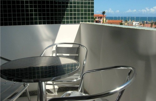 Armacao Apartment | Modern fully-furnished apartment with swimming pool, gym and game room.