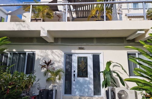 Savannes Apartment | Modern garden apartment close to airport and sea