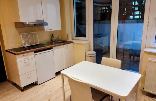Etterbeek Apartment | Modern half-basement 1BR near Montgomery & VUB