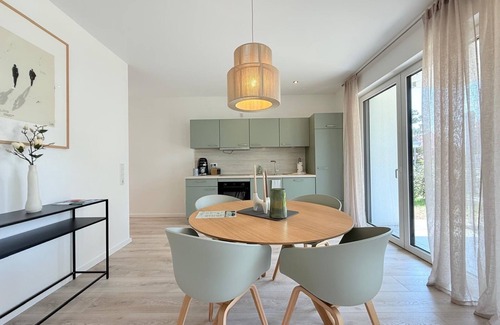 Unteruhldingen Apartment | Modern Harmony suite with covered terrace near the lake and beach in Uhldingen-