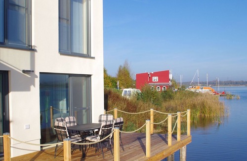 Kahnsdorf House | Modern holiday home directly in Hainer lake with boat