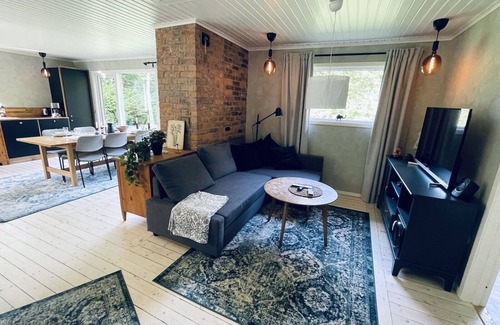 Broby House | Modern holiday home on the banks of Helgeån
