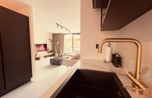 Bergen op Zoom House | Modern Holiday Home La Playa: near the beach, with 40 degree Jacuzzi!