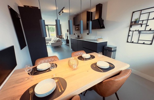 Bergen op Zoom House | Modern Holiday Home La Playa: near the beach, with 40 degree Jacuzzi!