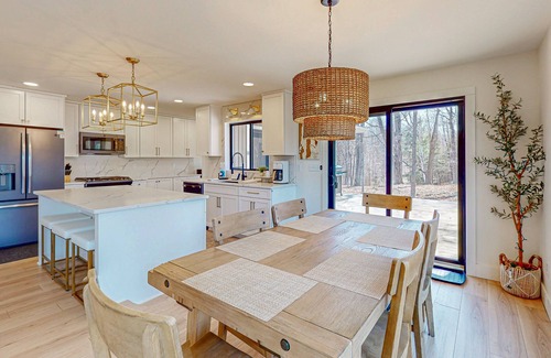 Bellaire House | Modern Home in the woods w/a large patio, gas grill, & near the lake