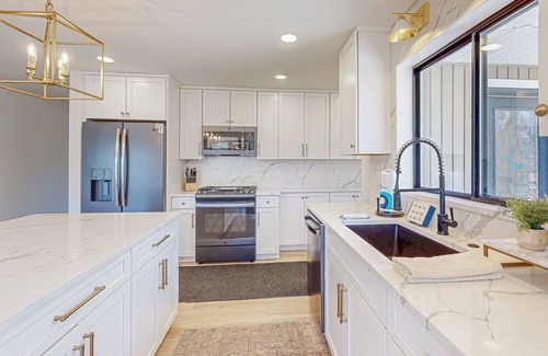 Bellaire House | Modern Home in the woods w/a large patio, gas grill, & near the lake