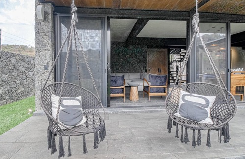 Tepoztlan House | Modern home with a private pool, hot tub, outdoor kitchen, & mountain views