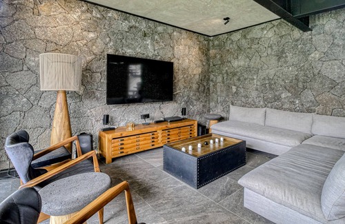 Tepoztlan House | Modern home with a private pool, hot tub, outdoor kitchen, & mountain views