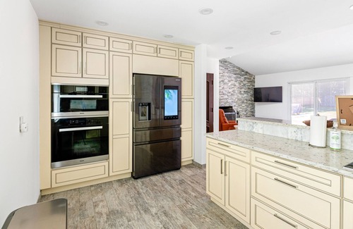 Southampton House | Modern home with large deck, firepit, enclosed yard, & immaculate kitchen