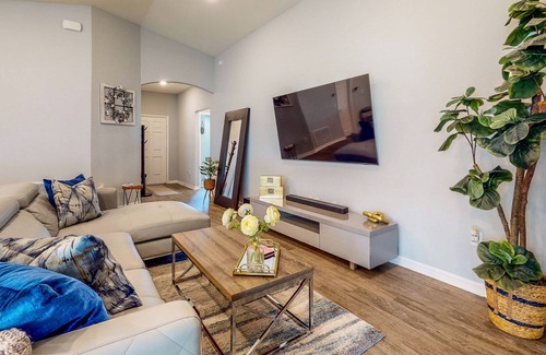 Palmetto House | Modern Home with Sunroom and Dazzling Kitchen
