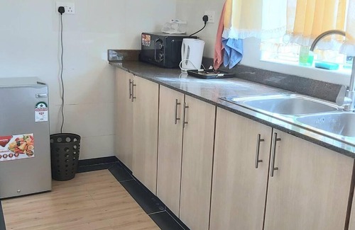 Langata Apartment | Modern &homely guest suite w/free parking in Karen