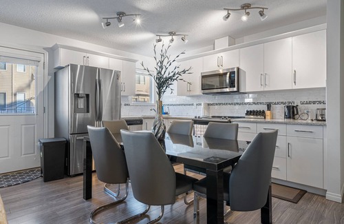 Southwest Calgary House | Modern House with Private Backyard and Fireplace