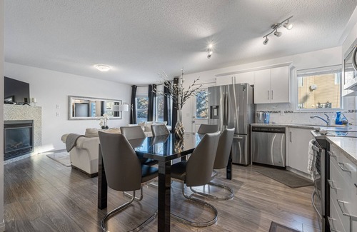 Southwest Calgary House | Modern House with Private Backyard and Fireplace