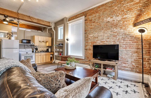 Sheridan Apartment | Modern Industrial Western Suite, Directly Downtown
