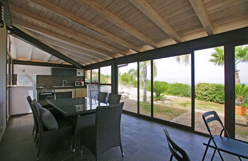Campofelice di Roccella Villa | Modern Villa with Private Golf Practice, Pool, Garden, Terrace, Wi-Fi, Sea View