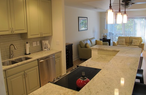 West Beach Cottage | Modern Lagoon View Steps from Beach Pool & Golf