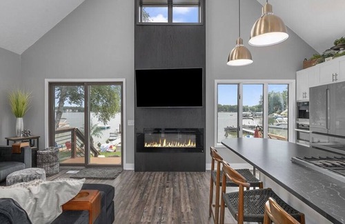 Rockford House | Modern Lake-Front Cottage on Bostwick Lake; Large Patio, Sandy Beach