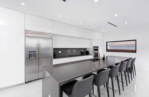 Glenvar Heights Villa | Modern Lakefront Villa w/Pool, Jacuzzi and Gym