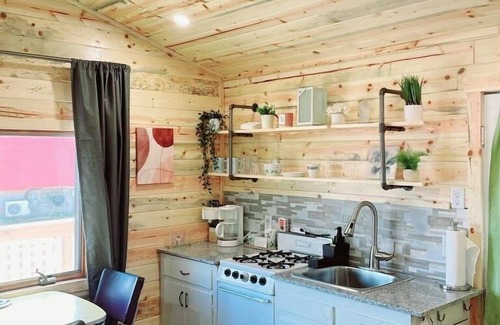 Alexandria Cabin | Modern lakeside cabin with panoramic views and deck.
