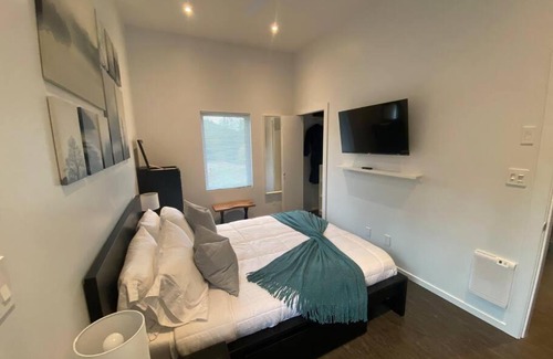Shawnigan Lake House | Modern lanai house, Trans Canada Trail adjacent.