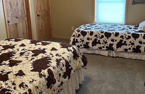 Gove County Cabin | Modern Lodge in quiet, country setting. Family, outdoorsman, and pet-friendly.