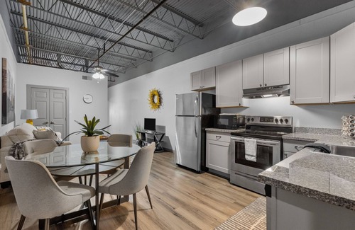 Baytown Apartment | Modern Loft Vibes Exposed Brick + Cozy Design