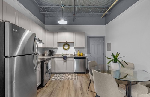 Baytown Apartment | Modern Loft Vibes Exposed Brick + Cozy Design