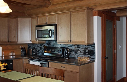 Central Okanagan Cabin | Modern Log Cabin on Okanagan Lake, Private Beach, Large Dock and Boatlift