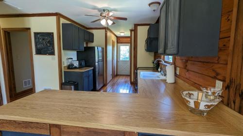 Winchester House | Modern Log House First Level Primary