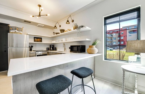 Ludington Condo | Modern Ludington Condo Across From the Lake!
