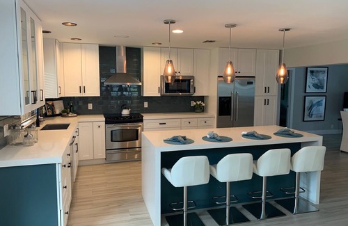 Dolphin Isles House | MODERN LUXURY: 4 Bedroom Heated Pool Home! Walk to beach & Restaurants!