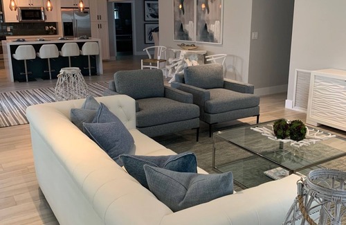 Dolphin Isles House | MODERN LUXURY: 4 Bedroom Heated Pool Home! Walk to beach & Restaurants!