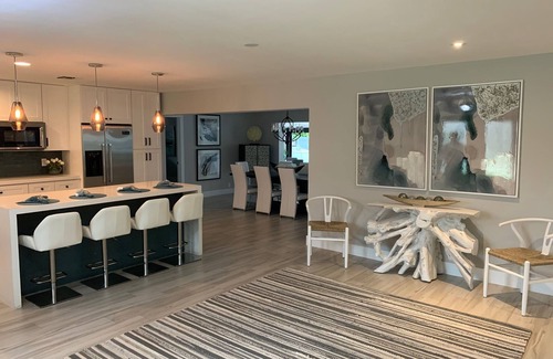 Dolphin Isles House | MODERN LUXURY: 4 Bedroom Heated Pool Home! Walk to beach & Restaurants!